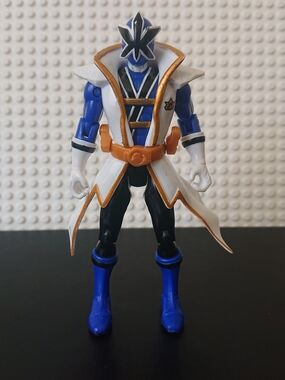 Power Rangers figure. Made by Bandai in 1995. Auto morphin head flipping green r